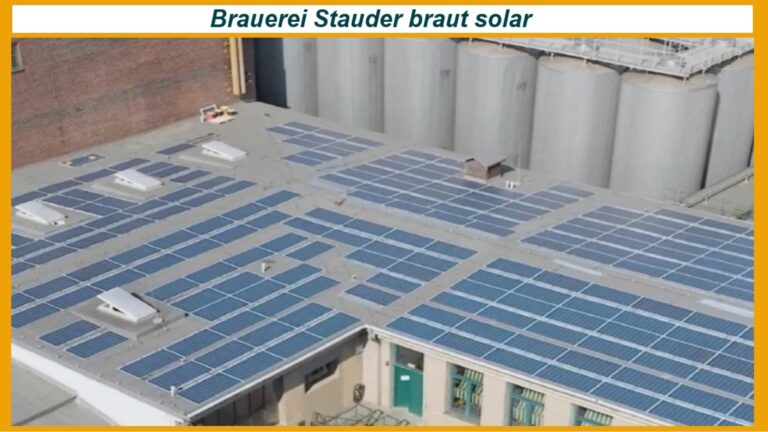 Luftbild einer Brauerei mit Solarmodulen auf dem Dach, die Photovoltaik zur Energiegewinnung nutzt.