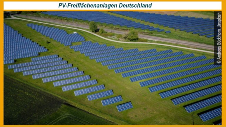 Ein Solarpark mit mehreren Solarpaneelen, der durch bürgerschaftliches Engagement zur Förderung erneuerbarer Energien entstanden ist.