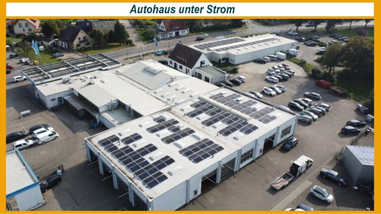 Luftbild eines Autohauses mit PV-Anlage und Ladeinfrastruktur in Tarmstedt.
