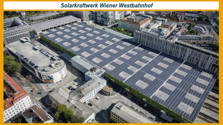 Luftbild des Wiener Westbahnhofs mit Visualisierungen der geplanten Photovoltaikanlage auf einer 25.500 m² großen Dachfläche.