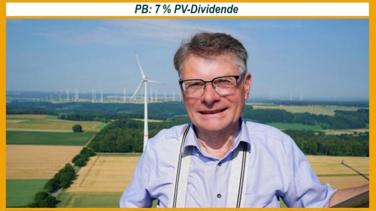 Heinz Sonntag auf einer Windkraftanlage mit weiteren Turbinen im Hintergrund. Die Energiegenossenschaft Paderborner Land eG hat eine Dividende von 7 % beschlossen.