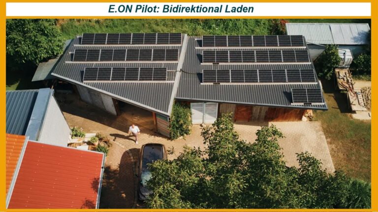 Luftaufnahme eines Hauses mit Solardach, symbolisch für nachhaltige Energie und bidirektionales Laden.