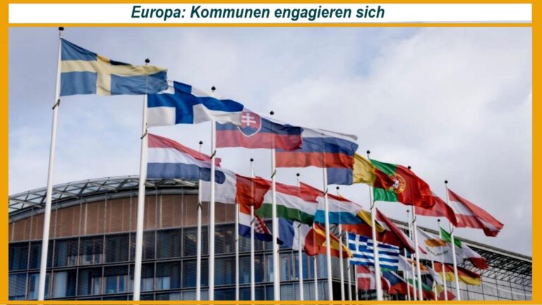 Europäische Flaggen wehen vor dem Gebäude der Europäischen Investitionsbank (EIB) – Symbol für die Unterstützung der Energiewende durch Städte und Kommunen.