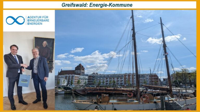 Bürgermeister Dr. Stefan Fassbinder nimmt stellvertretend für Greifswald die Auszeichnung „Energie-Kommune des Monats“ entgegen.