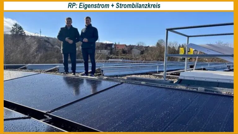 Blick auf Bürgermeister, Klimaschutzmanager und Photovoltaikanlage der Kindertagesstätte in Alzey.