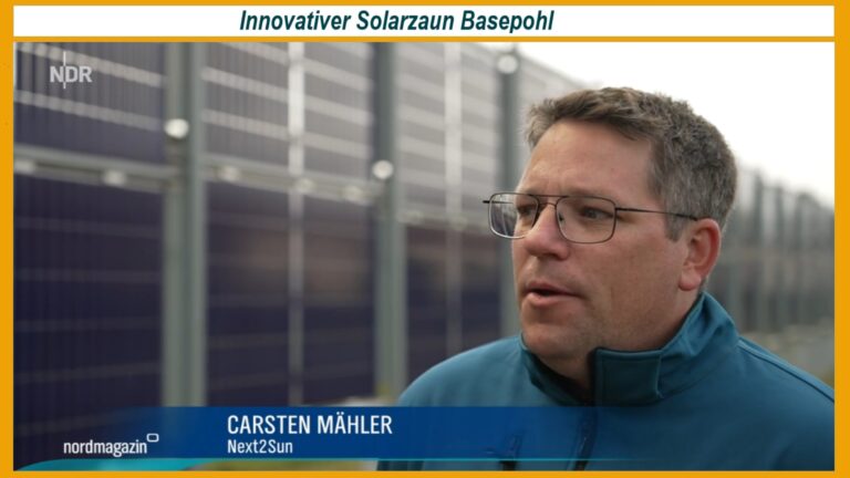 Solarzaun in Basepohl bei Stavenhagen mit Next2Sun-Technologie: Vertikal montierte bifaciale Solarmodule erzeugen vor Ort Strom für die Kühlung und Belüftung von Getreide in den Silos der Bio-Eichenmühle.