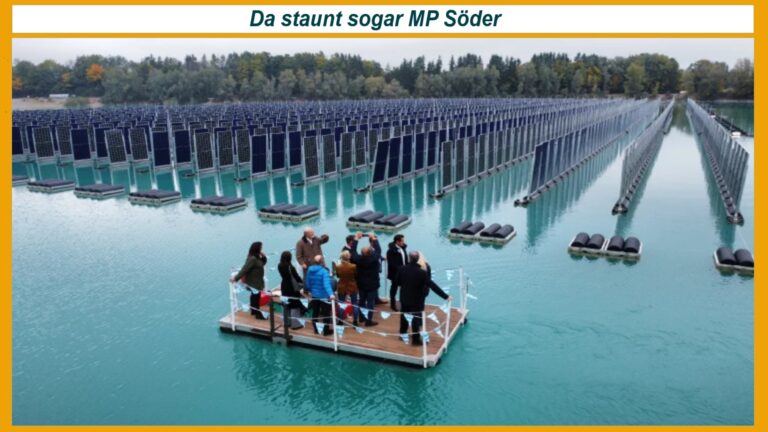 Geschäftsführer von SINN Power mit Ministerpräsident Dr. Söder auf Boot vor vertikaler Photovoltaikanlage.