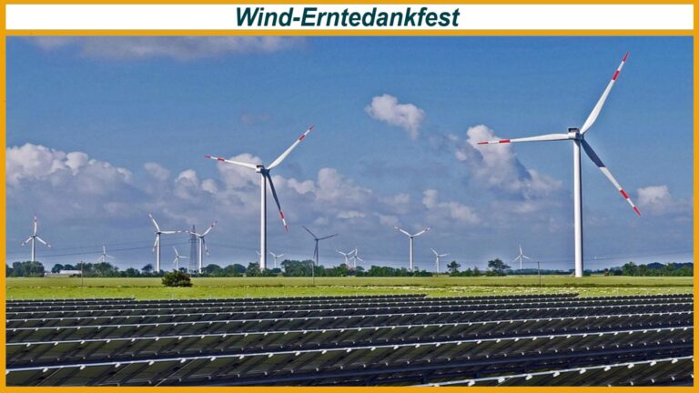 Solarfelder im Vordergrund und mehrere Windräder am Horizont, oben Schriftzug Wind-Erntedankfest.