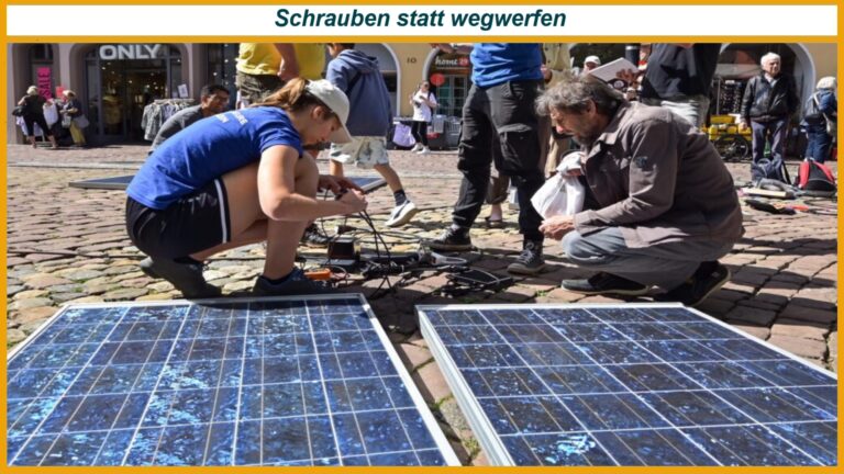 Teilnehmende arbeiten bei einer Steckersolar-Schraubenaktion von Balkon.Solar e. V. in Freiburg an gebrauchten Solarmodulen.